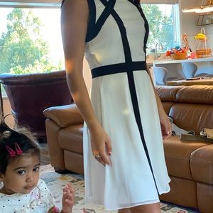 Flared dress, white and black, stylish and trendy